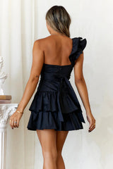 Black ruffled dress, a sweet yet edgy little black dress that flatters the figure